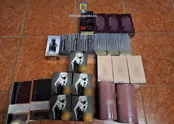 Polițiștii au găsit 23 de parfumuri contrafăcute, expuse spre comercializare într-un magazin din localitatea Roșiori