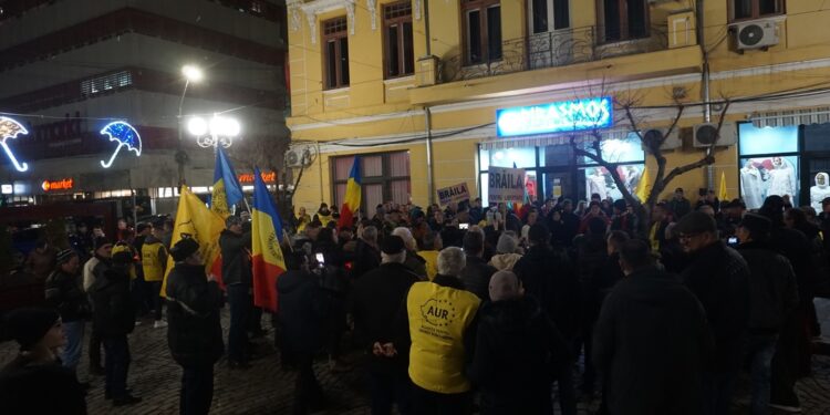 Protest cu lumânări electrice desfășurat de AUR în fața sediului PSD