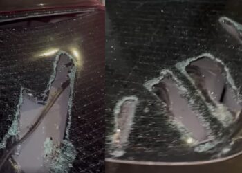 Autoturism aflat în trafic vandalizat de un grup de persoane