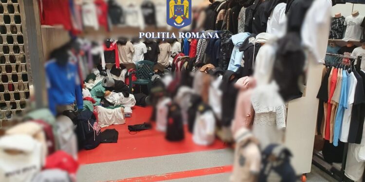 Percheziții într-un caz de punere în circulație de produse contrafăcute