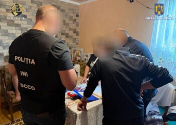 Percheziții într-o cauză de fraudă informatică și acces ilegal la un sistem informatic